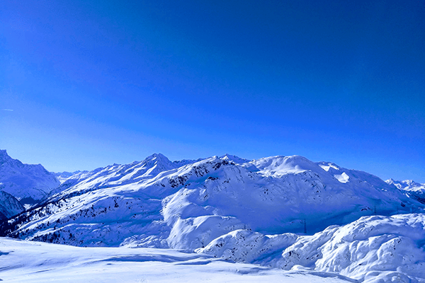 Blue skies and white snow